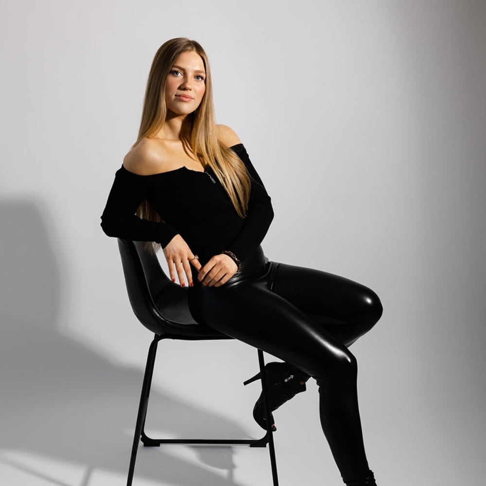 Revolve Black zip up going out top